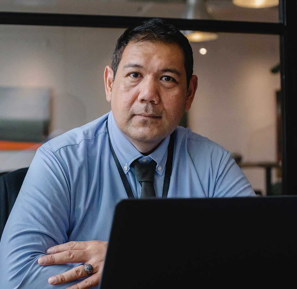 Man Working behind Laptop Man Working behind Laptop